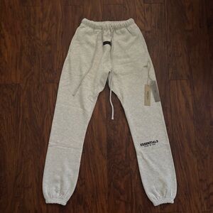 Essentials fear of god light oatmeal joggers adult size S
